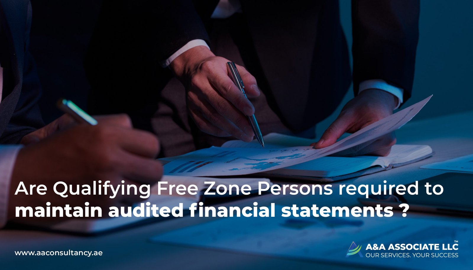 Are Qualifying Free Zone Persons required to maintain audited financial statements in UAE